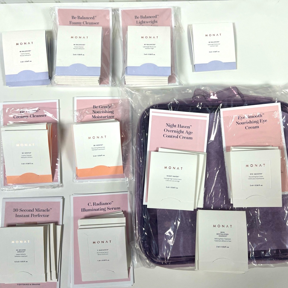 Lot of 60 MONAT skincare samples and travel bag!
